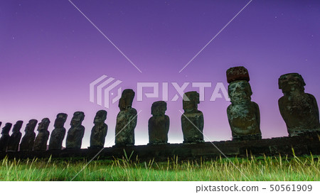 Dawn, stars and Moai statues of Ahu Tongariki on Easter Island 50561909