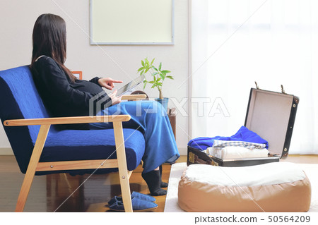 Pregnant woman checking list Preparing for childbirth Fall, winter, early spring 50564209