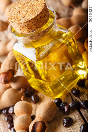 Freshly prepared tamarind seed oil in a glass jar Freshly prepared tamarind seed oil in a glass jar 50564234
