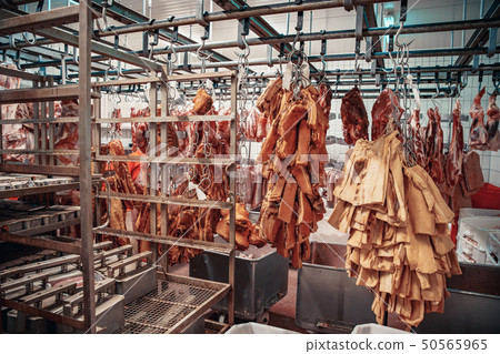 Production of meat products in the supermarket in the supermarket. Next, distribution of finished 50565965