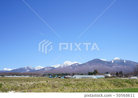 Yatsugatake in early spring with snow Yatsugatake in early spring with snow 50568611