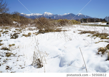 Yatsugatake in early spring with snow Yatsugatake in early spring with snow 50568612