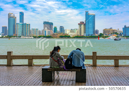 People sitting at the waterfront area of Gulangyu 50570635