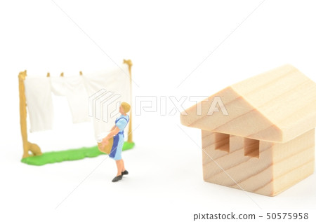 A woman who hangs washing 50575958