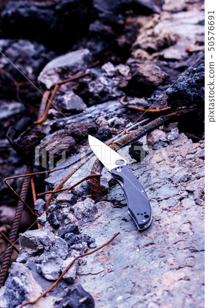 Photo of the knife at an angle. Lead line. 50576691