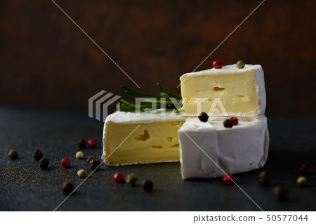 Cheese camembert or brie with fresh rosemary Cheese camembert or brie with fresh rosemary 50577044