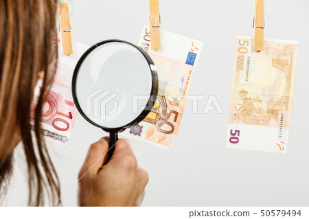 Man verify money cash Man verify money cash 50579494