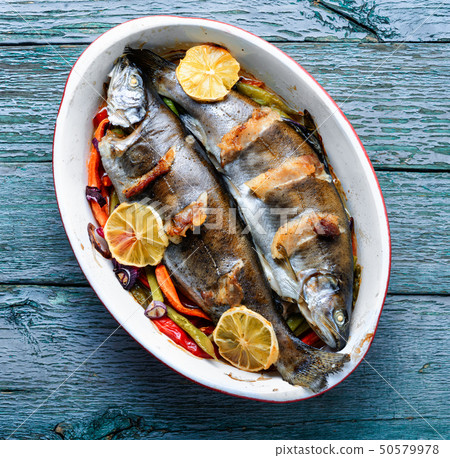 Trout with bacon and vegetables Trout with bacon and vegetables 50579978