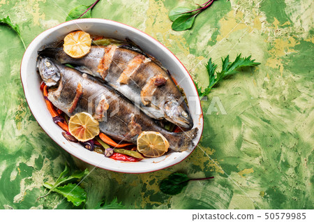Trout with bacon and vegetables Trout with bacon and vegetables 50579985