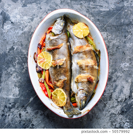 Trout with bacon and vegetables Trout with bacon and vegetables 50579992