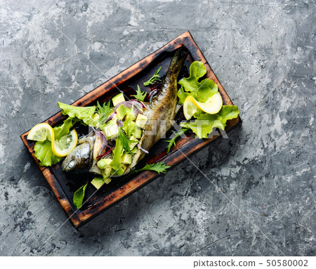 Baked fish with avocado Baked fish with avocado 50580002