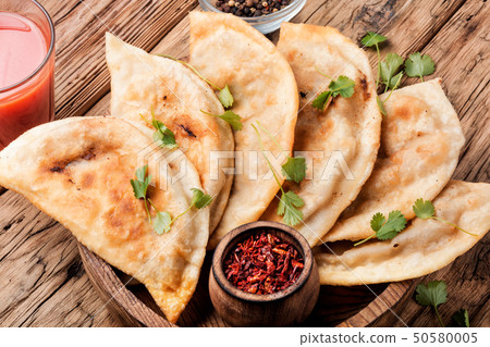 Cheburek,dough pie with meat filling 50580005