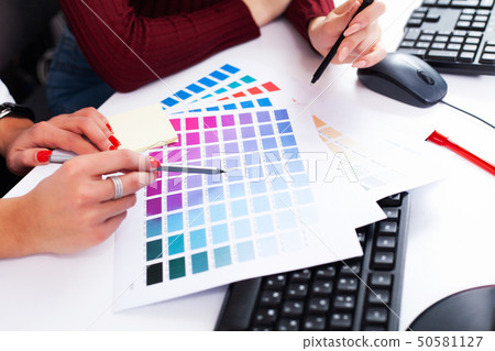 Woman Designer Working On Computer In Office on Modern Desktop Computer Woman Designer Working On Computer In Office on Modern Desktop Computer 50581127