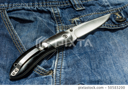 Peculiar folding knife with a black handle. 50583200