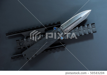 Black knife and black accessories. 50583204