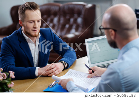 Confident man attending job interview Confident man attending job interview 50585188