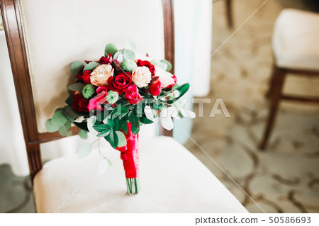 Beautiful wedding bouquet with different flowers, roses Beautiful wedding bouquet with different flowers, roses 50586693