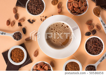 Natural cocoa beans and hot chocolate 50586858