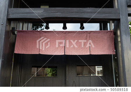 The curtain-like fabric that hangs in front of 50589318