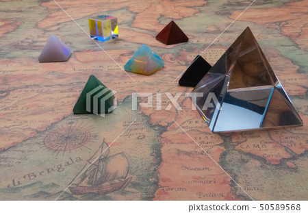 Crystal pyramide and small pyramids of natural gem Crystal pyramide and small pyramids of natural gem 50589568