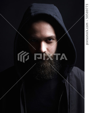 Bearded Handsome Man in Hood. Boy in a hoodie 50589773