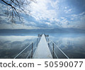 Metal pier on the lake 50590077