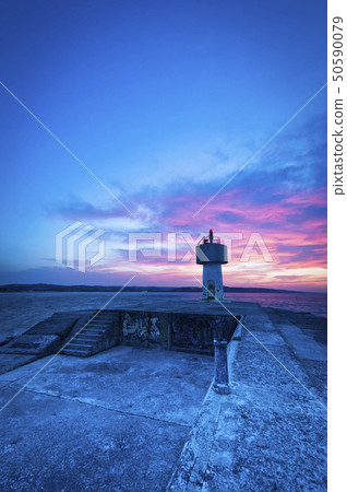 Lighthouse at sunset 50590079