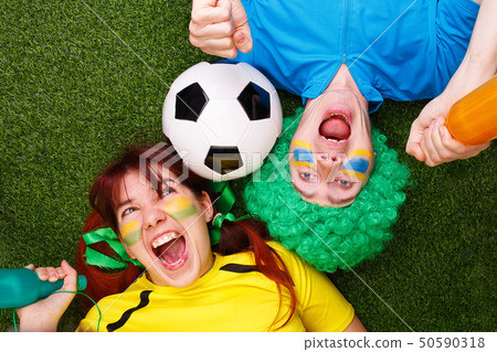 Soccer fans support their team and celebrate goal Soccer fans support their team and celebrate goal 50590318