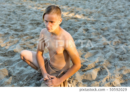 guy in loincloth on the background of sand guy in loincloth on the background of sand 50592029