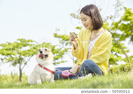 Wellness, puppy, walking, young woman Wellness, puppy, walking, young woman 50595012