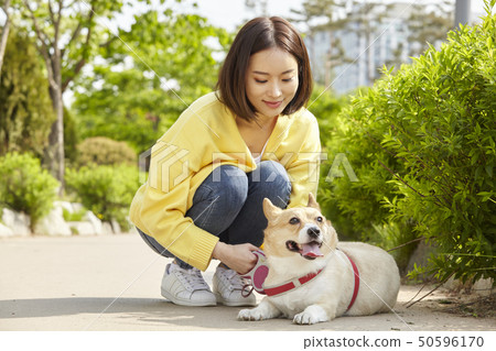 Wellness, puppy, walking, young woman Wellness, puppy, walking, young woman 50596170