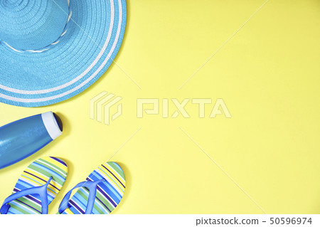 Flat lay yellow summer travel concept background Flat lay yellow summer travel concept background 50596974