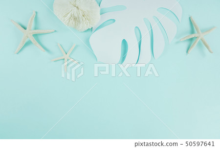 Summer background of paper palm leaves, paper concept 50597641