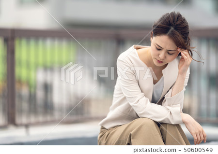 Depressed business woman 50600549
