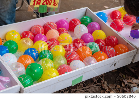 A stall with water balloons on the festival day 50602840