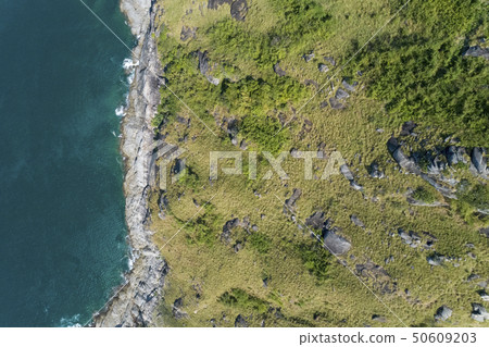 Tropical sea with wave crashing on seashore and 50609203