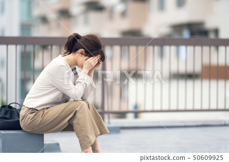 Depressed business woman 50609925