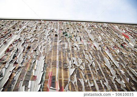 An old peeled wall of old paint An old peeled wall of old paint 50610035