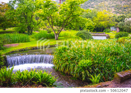 eden garden fairytale waterfall fountain in the Giardino di Ninfa - Cisterna di Latina - Lazio - eden garden fairytale waterfall fountain in the Giardino di Ninfa - Cisterna di Latina - Lazio - 50612047
