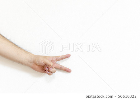 A man's hand putting out a throb 50616322