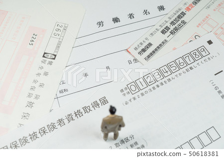 A person who stands for labor insurance documents A person who stands for labor insurance documents 50618381