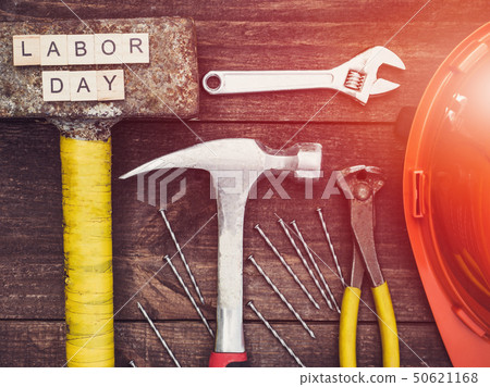 Tools and wooden letters with the inscription LABOR DAY Tools and wooden letters with the inscription LABOR DAY 50621168