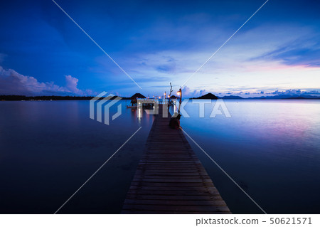 Wooden bridge at dusk Wooden bridge at dusk 50621571