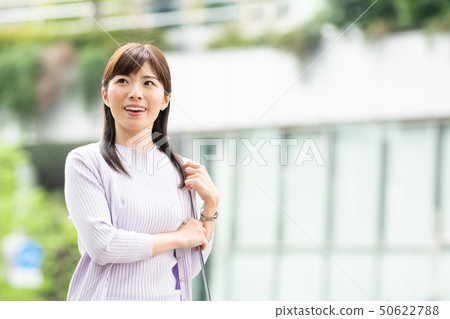 Business woman commuting to work 50622788