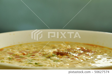 soft boiled instant noodles in hot water on bowl soft boiled instant noodles in hot water on bowl 50627574