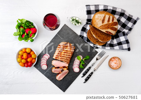 Grilled beef steak medium rare on stone board  50627681