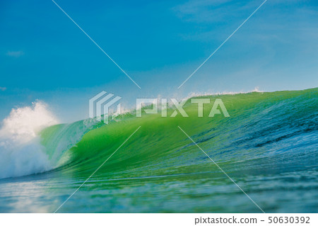 Big green wave in ocean. Breaking wave in Bali 50630392