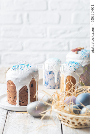Easter table with Easter cakes 50633401