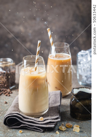 Ice coffee in a tall glasses Ice coffee in a tall glasses 50633442