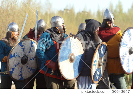 Slav warriors in reenactment battle Slav warriors in reenactment battle 50643647